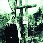 Romo senelė iš mamos pusės Elena Malinauskaitė Mackevičienė prie vyro Simono kapo 1936 metais